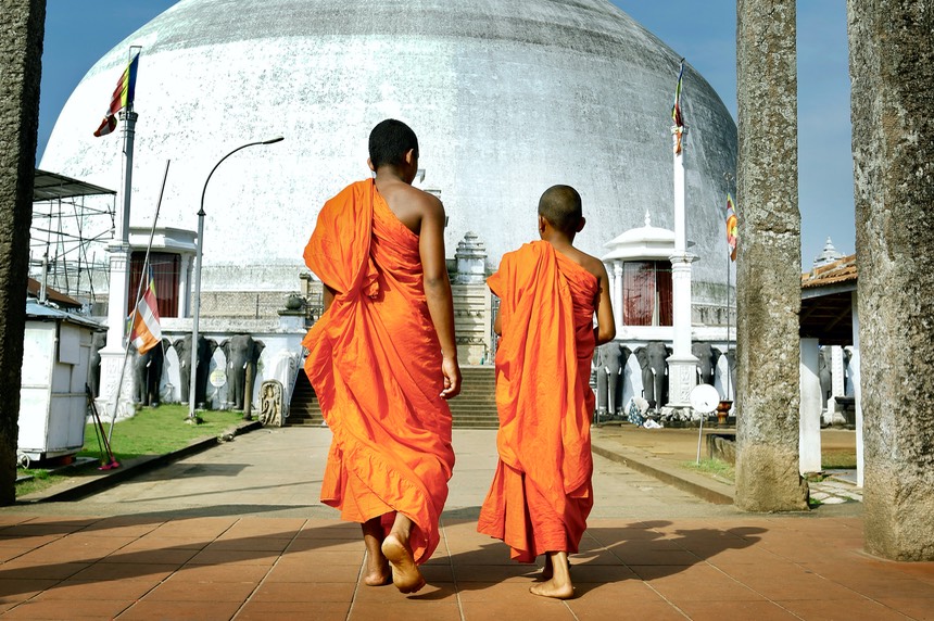 monks coming in ruwanwelisaya stupa in anuradhapura historical parc ,Sri Lanka